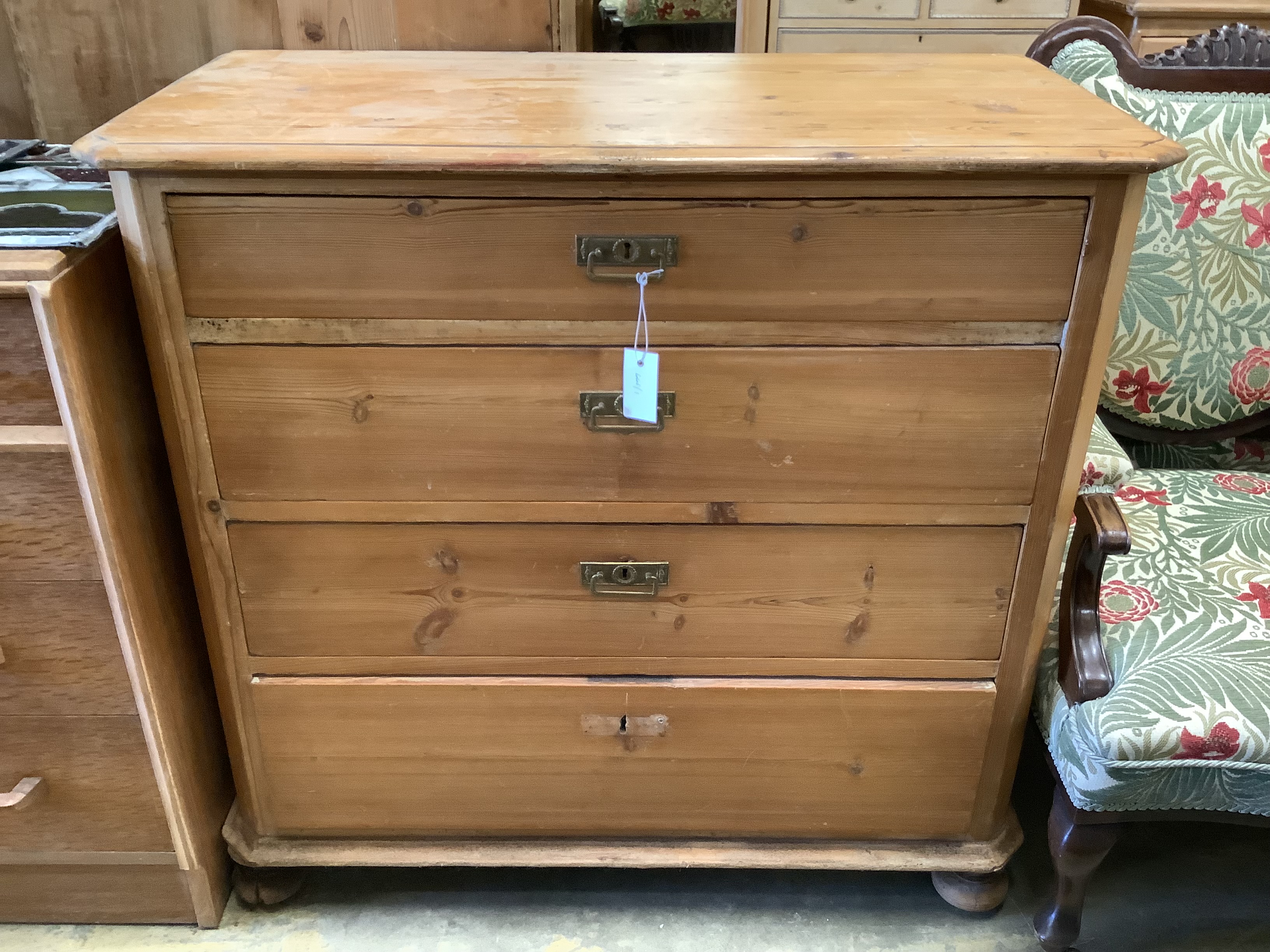 A 19th century continental pine chest of four drawers, width 99cm, depth 49cm, height 94cm